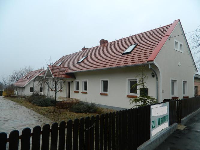 An old and a new house on the one plot