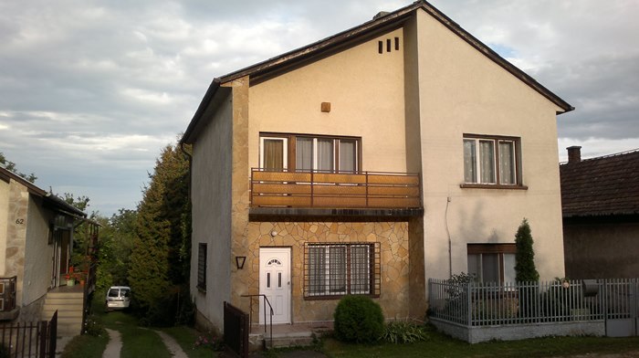 House with big plot of field